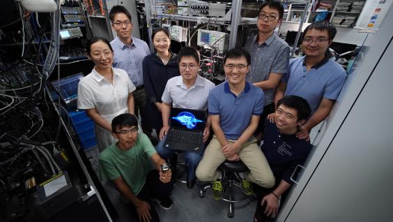 Prof. DU Shengwang (middle left, seated), Prof. LIU Junwei (middle right, seated), Prof. JO Gyu-Boong (back left, standing) and their research team 
