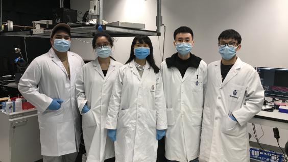 Prof. Huang (third left) and her research team.