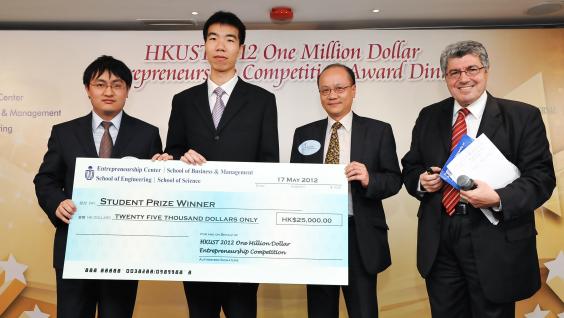 Mr Chris Tsang (2nd from right) from the School of Business and Management presents the Student Prize to Abacus Ltd.