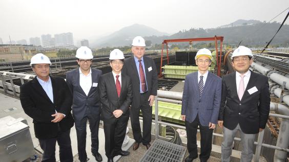  The consortium partners, joined by Mr Wing-cheong Fung (second from right), Senior Electrical &amp; Mechanical Engineer, Electrical &amp; Mechanical Projects Division of the Drainage Services Department, visit the SANI Sewage Treatment Plant at the Shatin Sewage Treatment Works.