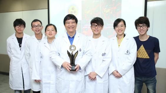  Prof Ben Zhong Tang (middle) and his research team.
