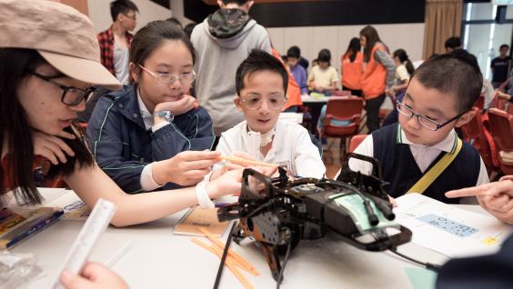 Students are trying to improve the performance of their robot.