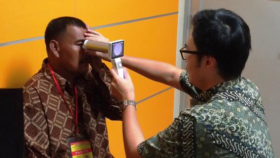  The student is testing the use of a portable fundus camera for diabetic retinopathy screening in a clinic in Indonesia.