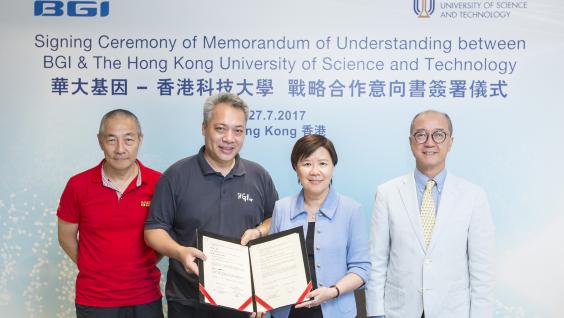  HKUST President Prof Tony F Chan (first right) and BGI Group President and Co-founder Prof Wang Jian (first left) officiate at the ceremony and witness the MoU signing by Prof Nancy Ip, HKUST Vice-President for Research and Graduate Studies (second right) and Mr Duncan Yu, BGI Group Vice President.